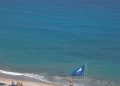 Bandera azul en la playa de l'Alfàs del Pi.